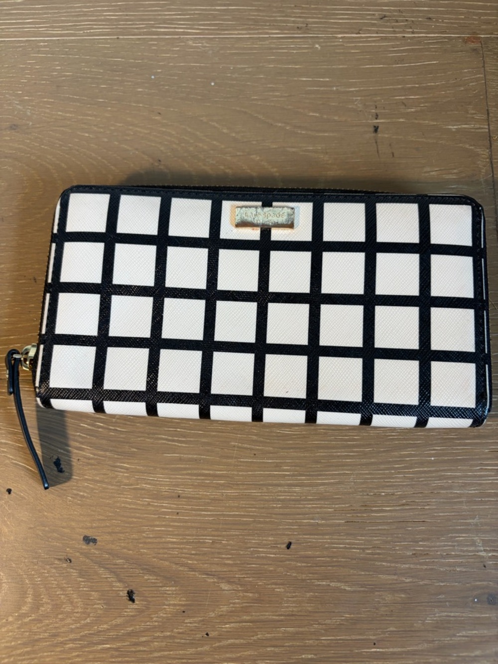 kate spade Black Leather Zip-Around Wallet with Gold Accents
